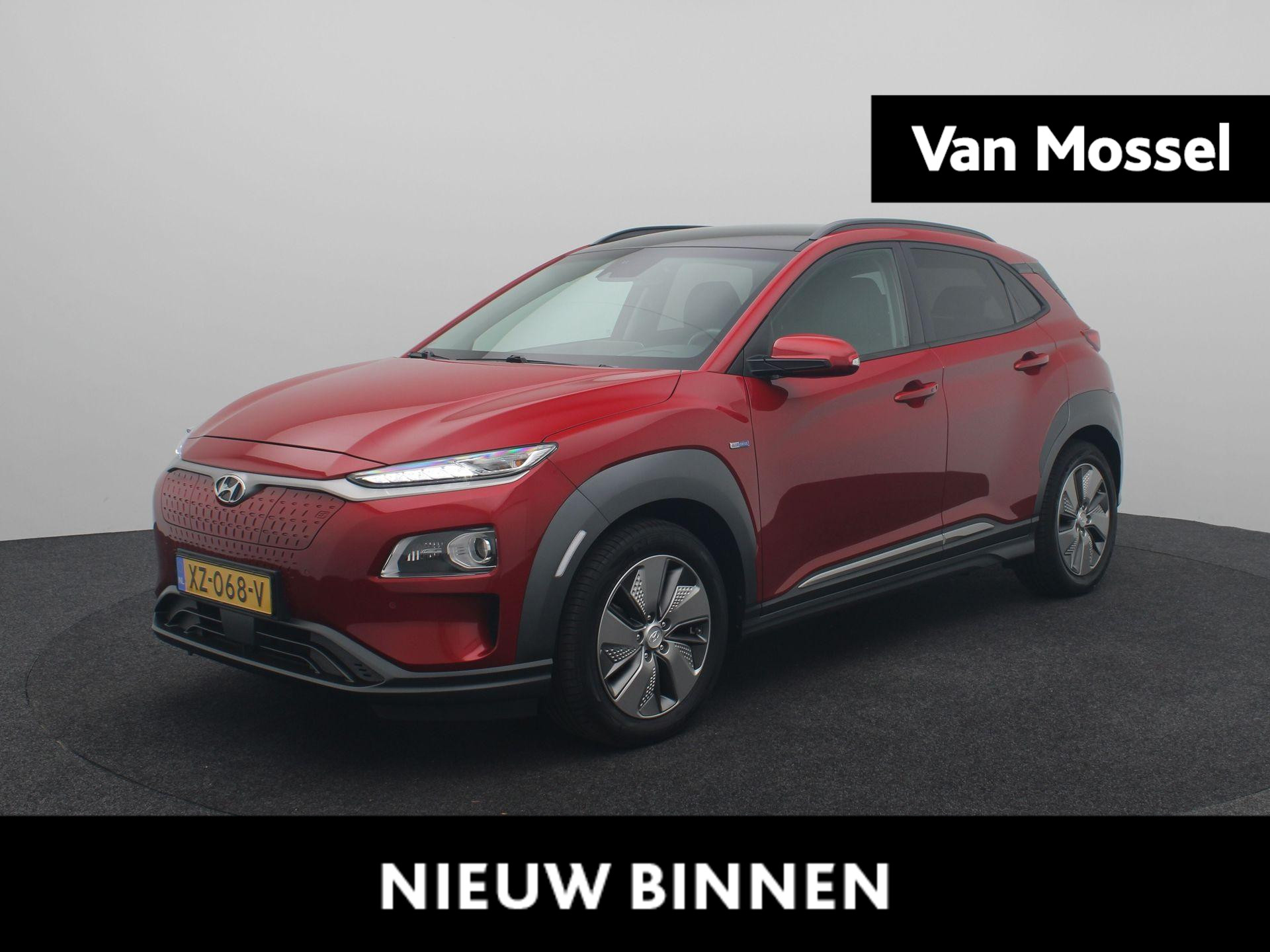 Hyundai Kona EV Premium 64 kWh | Navigatie | Achteruitrijcamera | Cruise Control | Leren Bekleding | Trekhaak |
