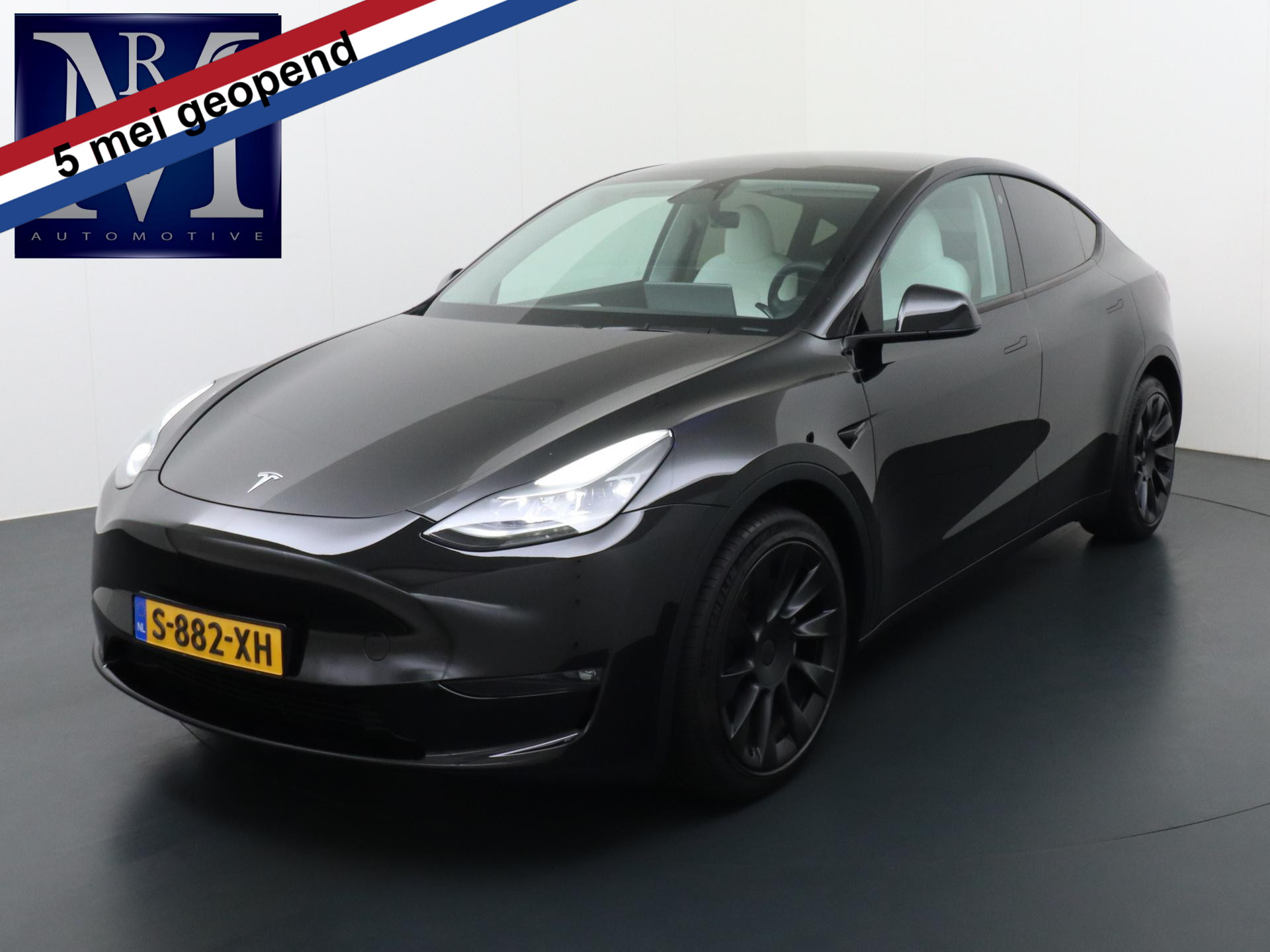 Tesla Model Y Long Range AWD 75 kWh AUTOPILOT | WIT LEDER | TESLA GARANTIE T/M 04-2027