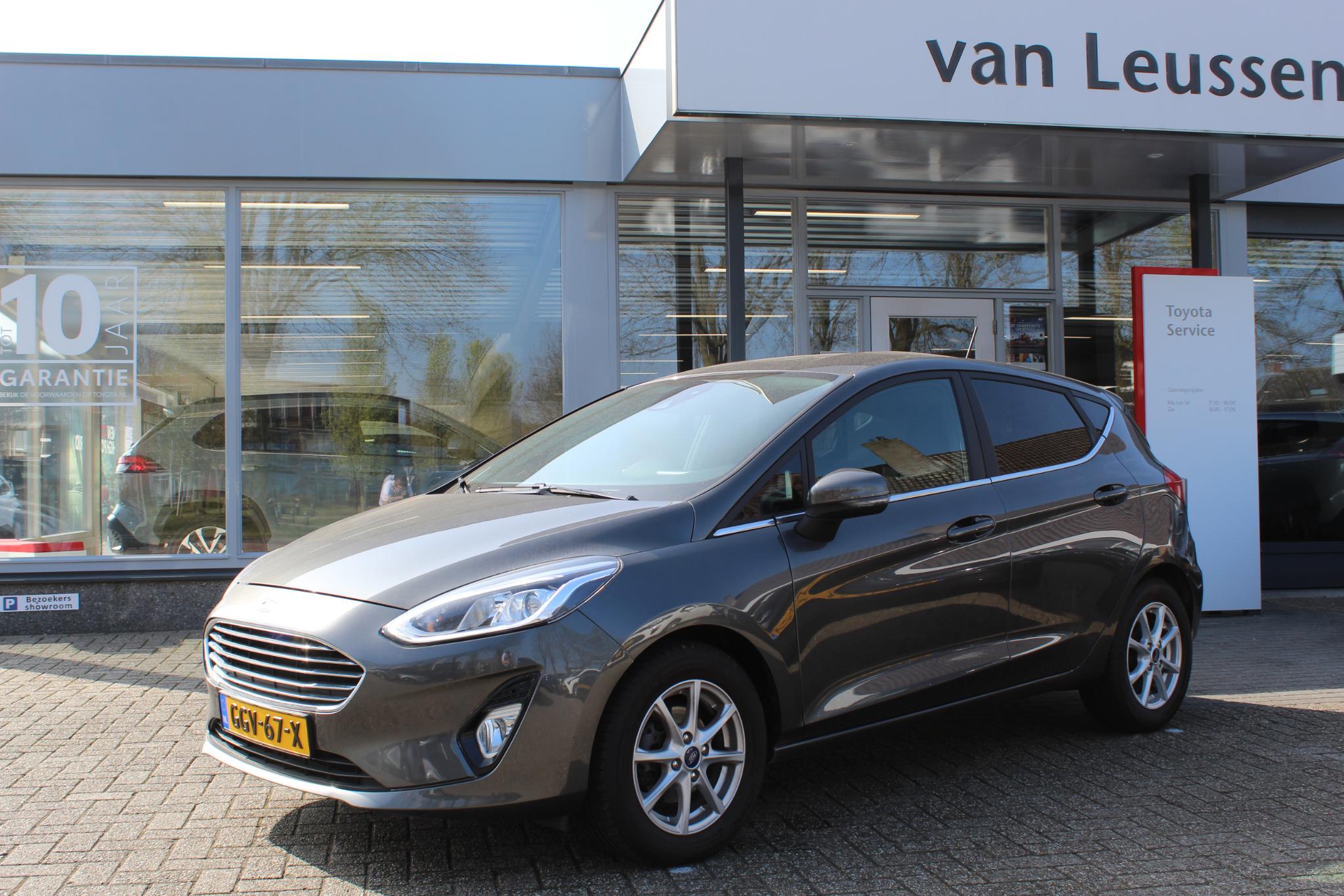 Ford Fiesta TITANIUM 5-DEURS APPLE/ANDROID STOEL/STUUR & VOORRUITVERW. DAB CRUISE PRIVACY-GLASS PARK-SENSOREN