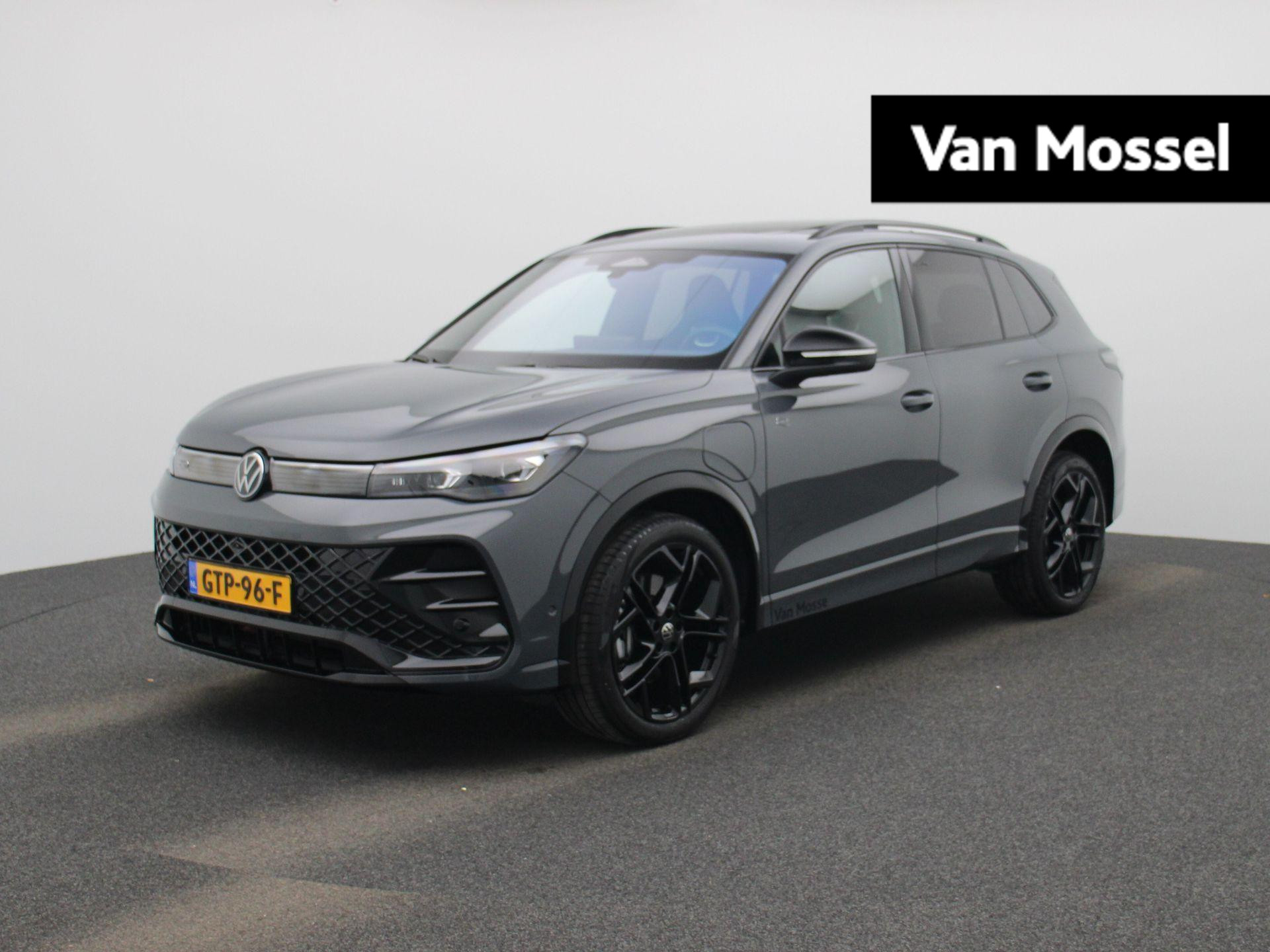 Volkswagen Tiguan 1.5 eHybrid R-Line Business 272 PK | Automaat | Navigatie | Cliamatronic | Leder | Lane Assist | Apple Carplay | Stoelverwarming | Parkeersensoren voor- en achter | Achteruitrijcamera | Elektrische Achterklep | Blackstyle Pakket | 20 inch lichtmetalenvelgen |