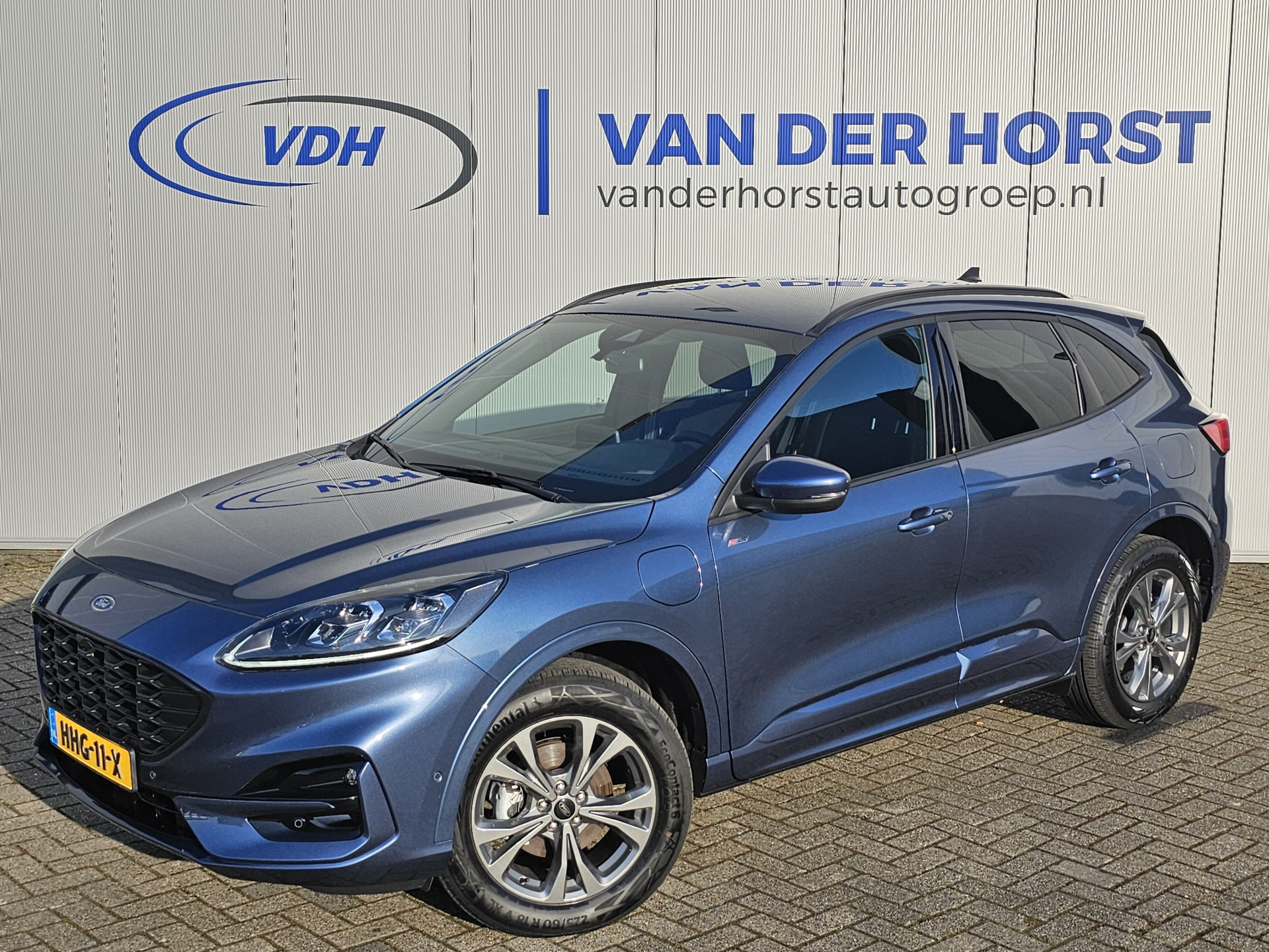 Ford Kuga 2.5-225pk PHEV ST-Line X Plug-in Hybrid. Garantie t/m 04-02-2028 ! Slechts 5.500km ! Volautm. airco dual, elektr. achterklep, LM wielen, stuur-, stoel- en voorraamverwarming, camera v+a,  side- en lane assist, adaptieve cruise cntrl, metallic lak, etc.