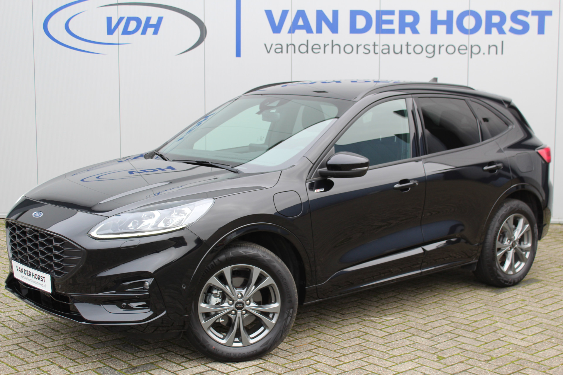 Ford Kuga 2.5-225pk PHEV ST-Line X. Let op ! Slechts 9.600km ! Volautm. airco dual, stoel- en voorraamverwarming, side- en lane assist, metallic lak, navigatie, telefoonvoorb., camera v+a, keyless entry/keyless go, elektr. achterklep, LM wielen, B&O soun