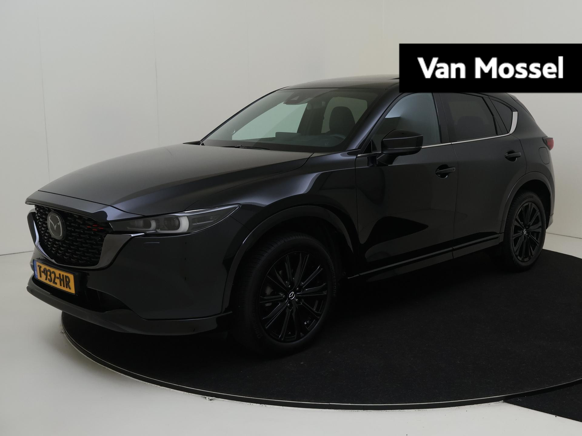 Mazda CX-5 2.0 e-SkyActiv-G M Hybrid 165 Homura | Trekhaak |  Head-up Display | Climate Control | 360 Camera | Stoelverwarming |  Cruise Control adaptief | Dodehoek detectie | 19 inch Velgen | Parkeersensoren |