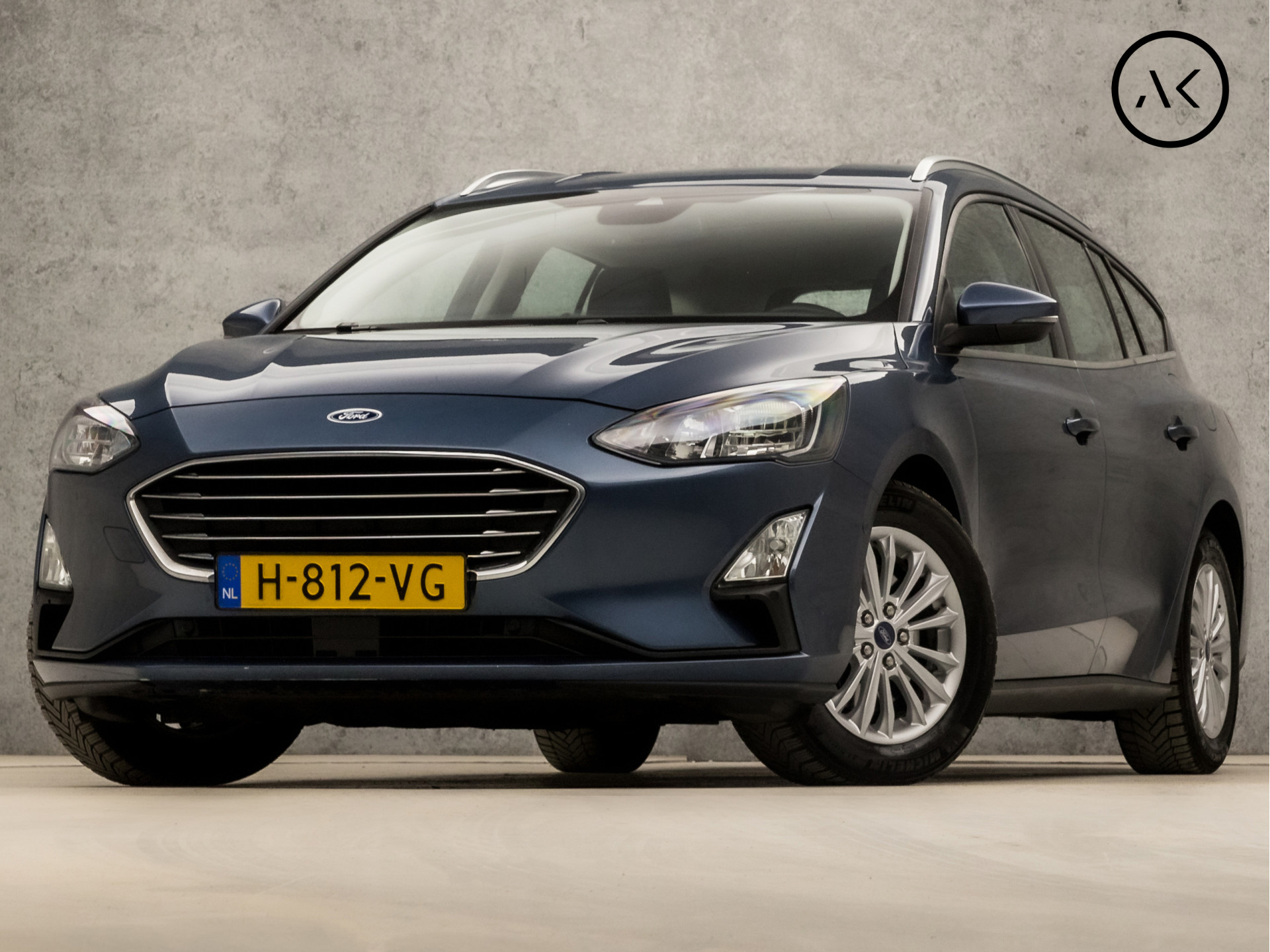 Ford Focus Wagon 1.0 EcoBoost Titanium Business Automaat (APPLE CARPLAY, GROOT NAVI, STUUR/STOELVERWARMING, ADAPTIVE CRUISE, SPORTSTOELEN, CAMERA, KEYLESS, TREKHAAK, NIEUWSTAAT)