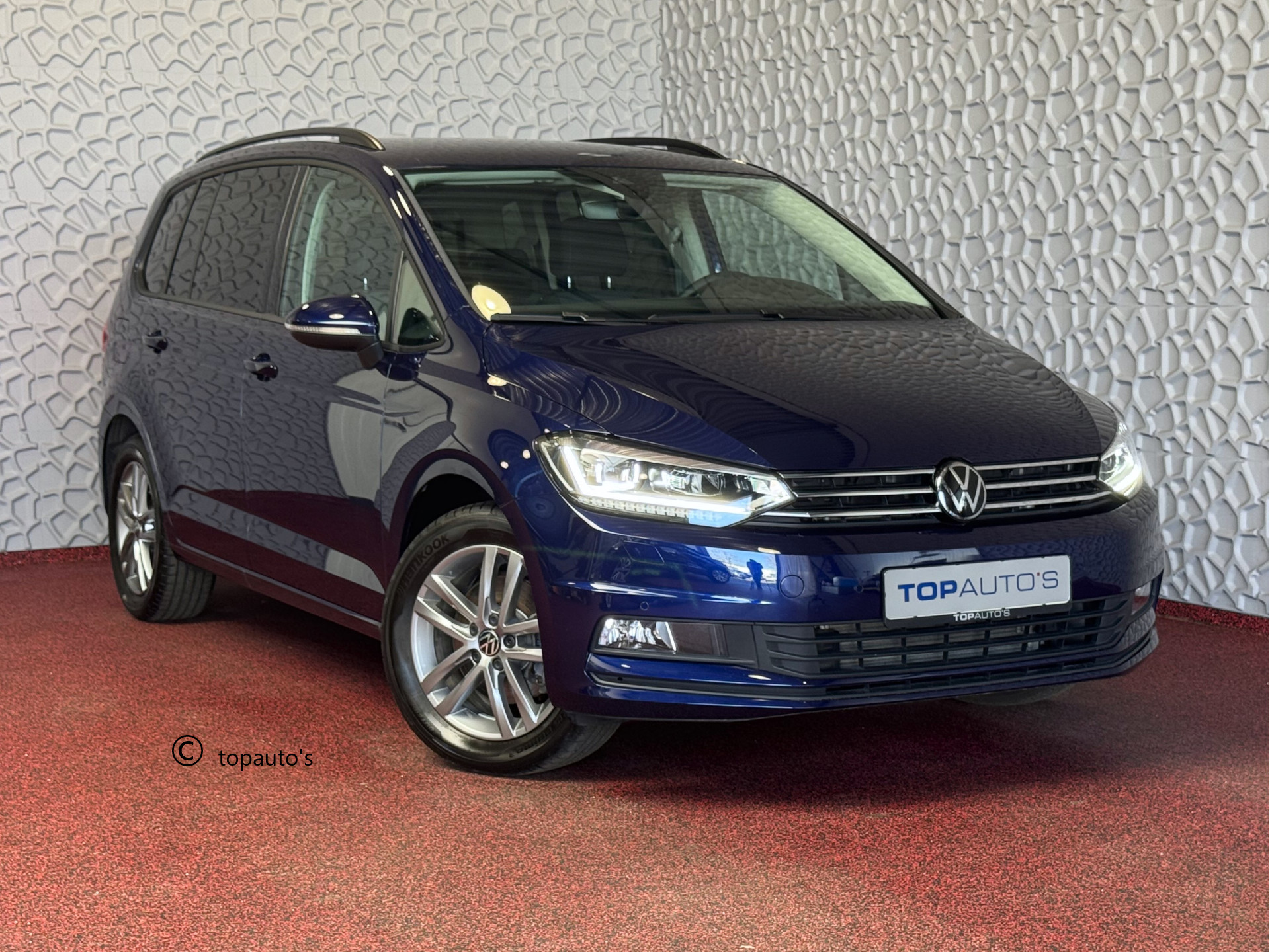 Volkswagen Touran 1.5 TSI 150PK 7P CARPLAY NAVI CAMERA LED ELEK.KLEP VIR.COCKPIT DODE.HOEK DET. STOELVERW KEYLESS 7P 7PERS 09/2024 "Volkswagen rijden begint bij Topautos.nl – 75 topmodellen direct op voorraad!"