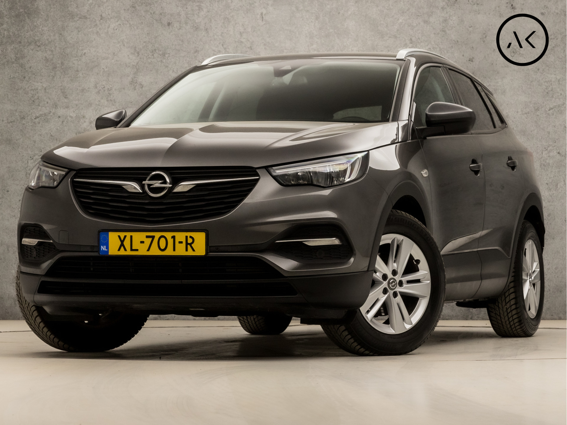 Opel Grandland X 1.2 Turbo Sport (APPLE CARPLAY, GROOT NAVI, CAMERA, LEDER, GETINT GLAS, SPORTSTOELEN, PARKEERSENSOREN, CRUISE, NIEUWE APK, NIEUWSTAAT)